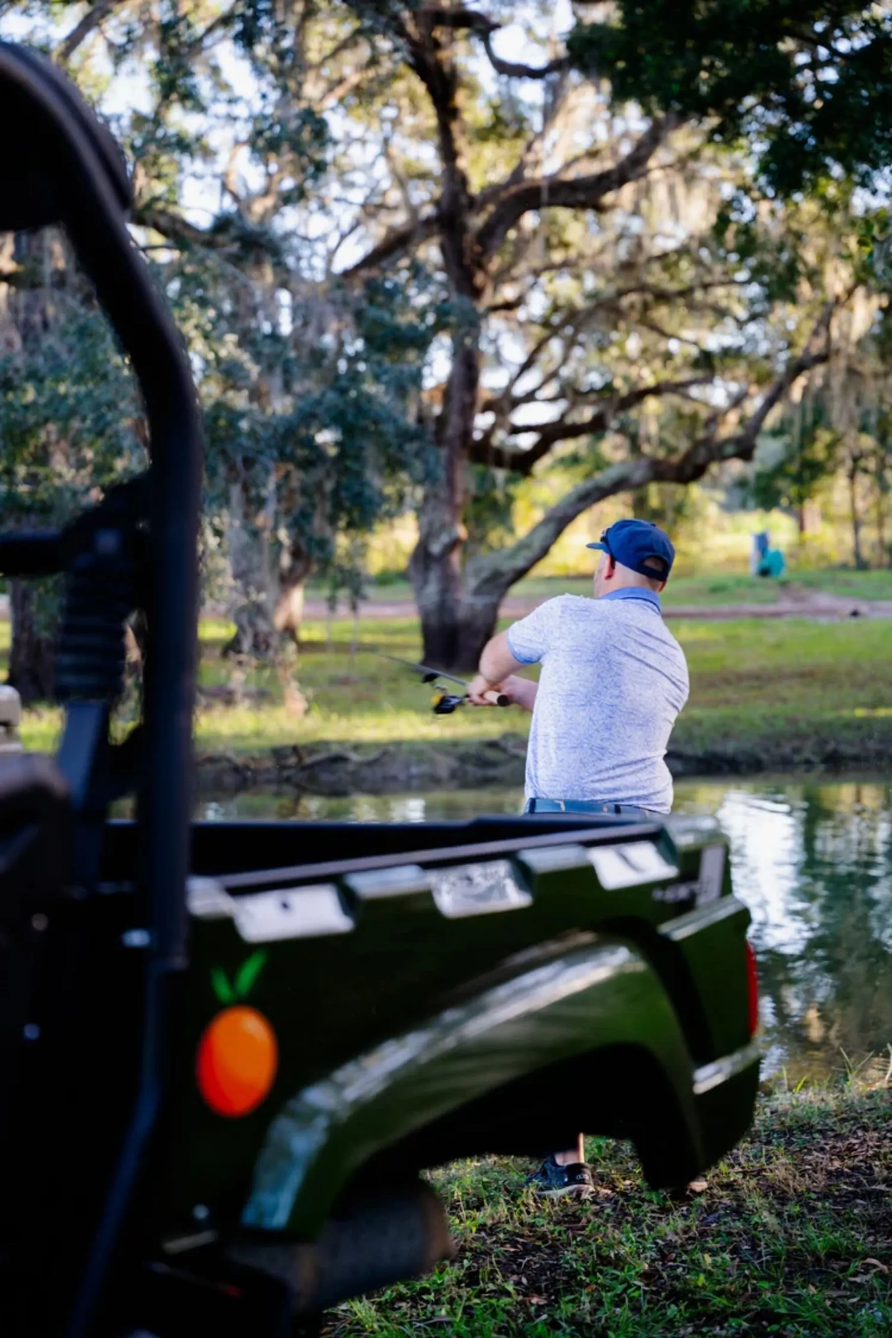 Fishing beside a Cabot utility vehicle