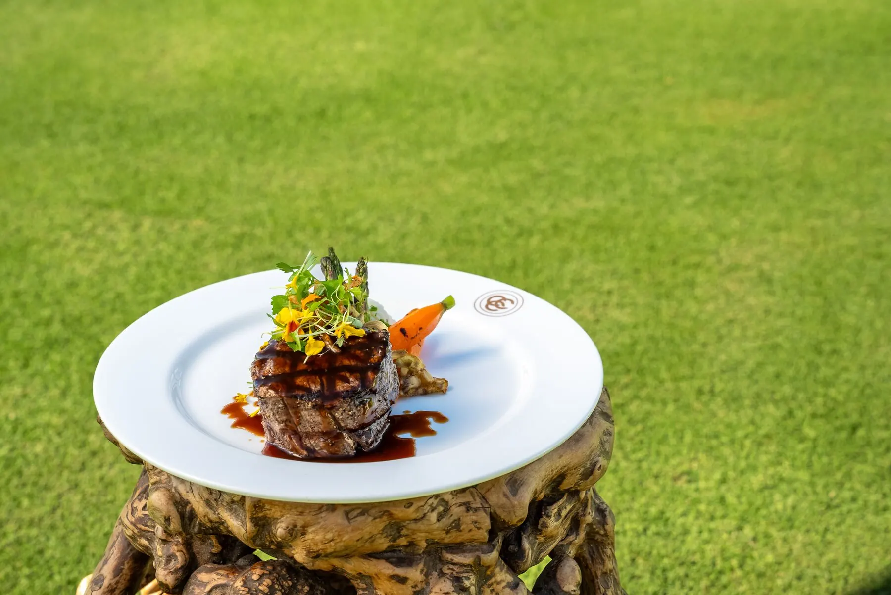 Plated steak dish at Coral Creek Club