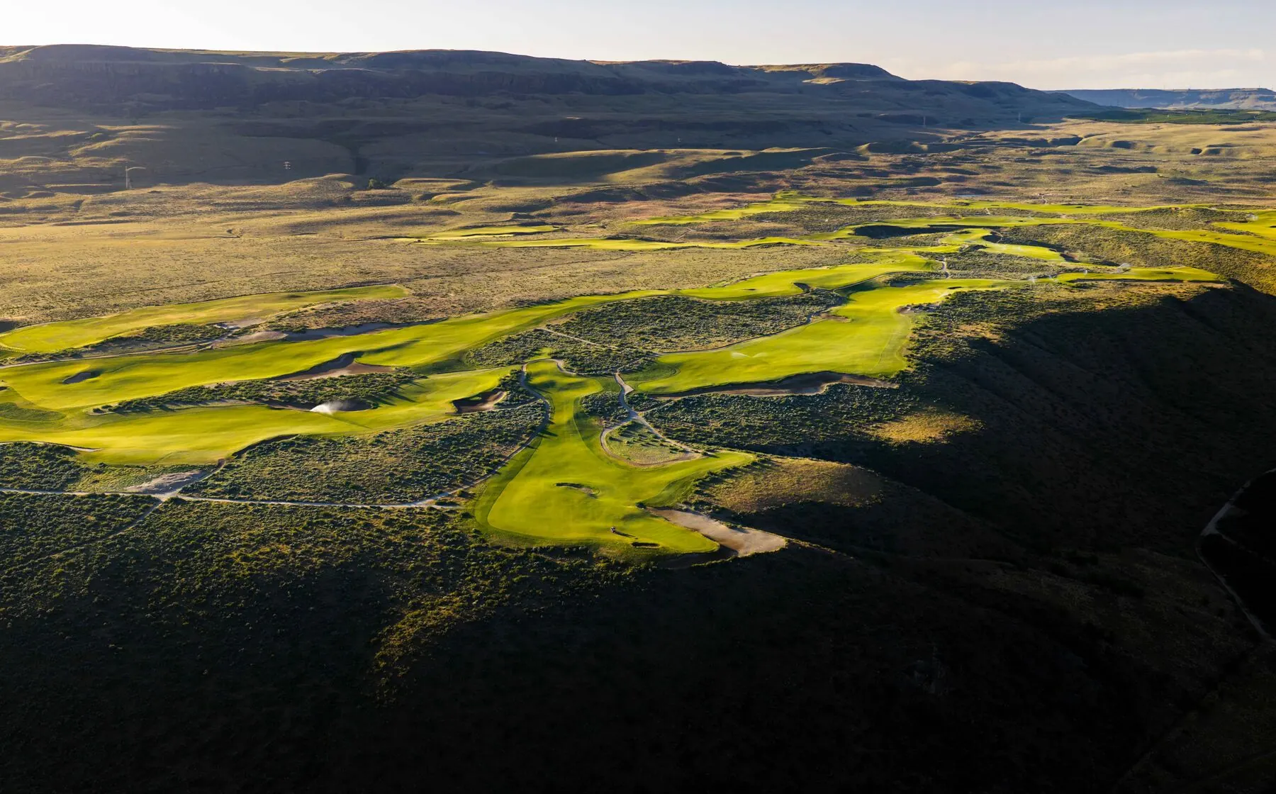 Green and desert terrain at Gamble Sands