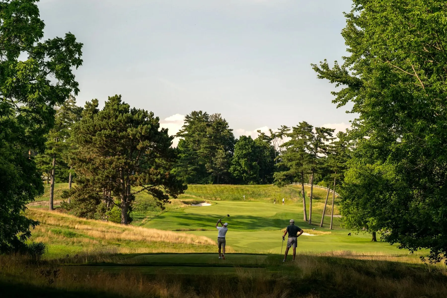 Caddie walking the course at Toronto Golf Club